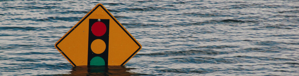 street sign partway under water